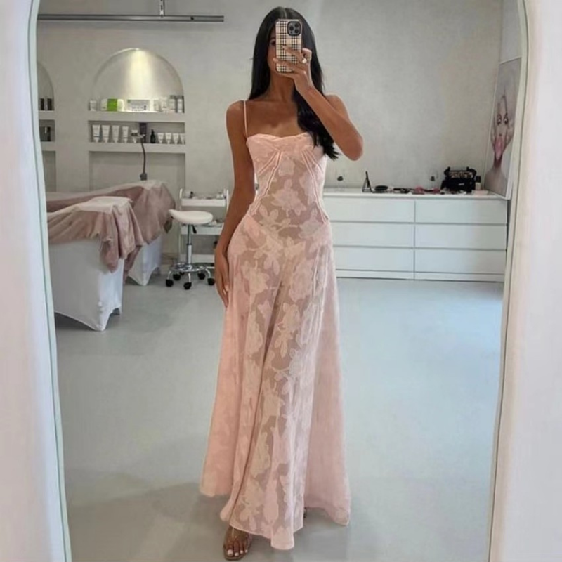 Nova – Mouwloze lange jurk met open rug en bloemenprint Velani