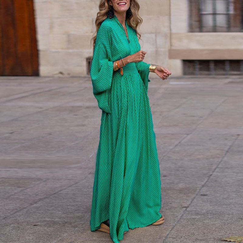 Nora – Lange maxi-jurk met wijde mouwen en geruit patroon Velani